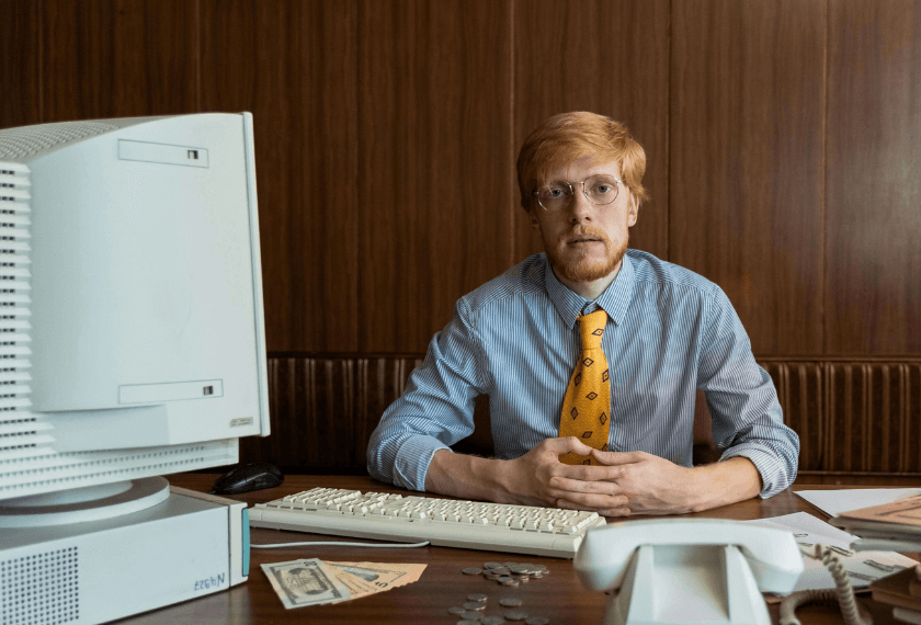 80s office computer and worker