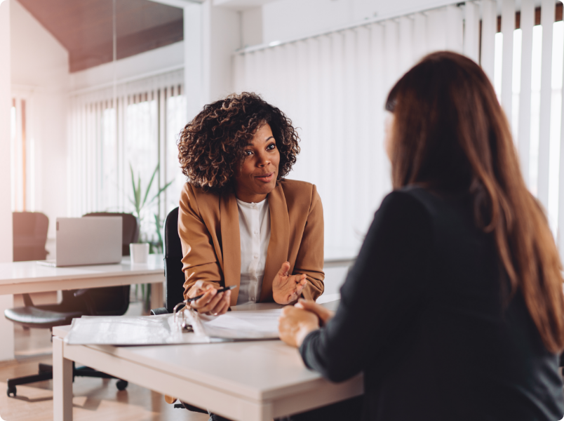 Two women speaking